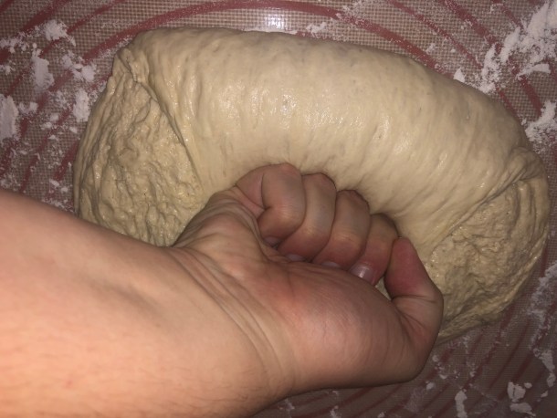 Cooking Eorzea | Punching down dough.