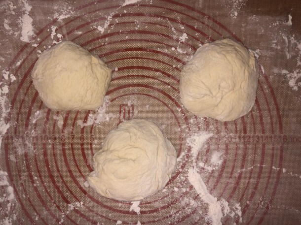 Cooking Eorzea | Dividing up pizza dough into balls.